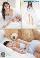 A woman laying on a bed with a teddy bear.